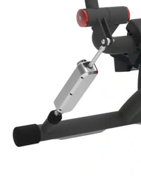 Silver metallic cylindrical component with red accents on black frame of re-life series ab back home fitness machine