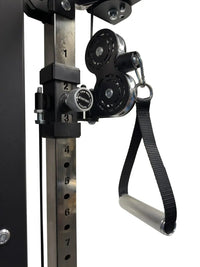 Black and silver dual adjustable pulley system with textured grip handle attached to rhino compact gym folding half rack