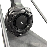 Black rugged textured circular flywheel with central g logo and concentric ridges for ski max 2.0 deka home workout