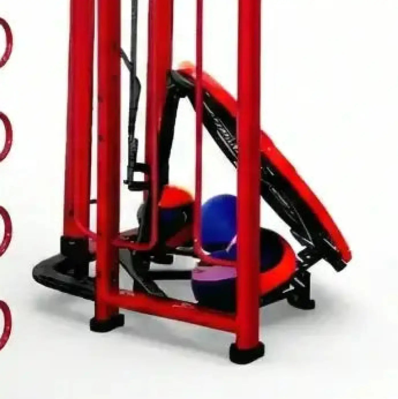 Red metal spartan rig exercise machine with colorful medicine balls designed for uk delivery and functional fitness use