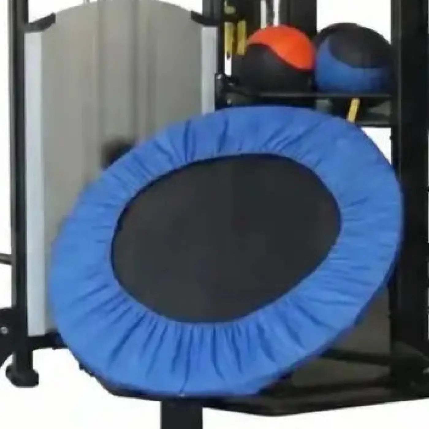 Blue trampoline with a black center pad designed for home workouts by Spartan Studio Rig