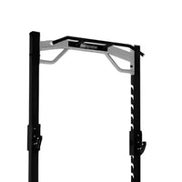 Black and silver sterling series elite half rack with sturdy frame adjustable safety pins and padded top bar for home gyms