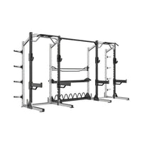 Black and silver metal Sterling Series elite half rack with adjustable safety bars and weight plate holder for home gyms
