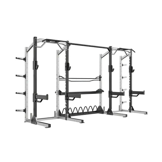 Black and silver metal Sterling Series elite half rack with adjustable safety bars and weight plate holder for home gyms