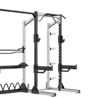 Sterling Series elite half rack in black and silver with adjustable safety bars weight plate holders and pull-up bar for home gyms