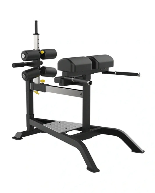 Black metal sterling series glute ham bench with adjustable weight plates and padded seating for uk delivery