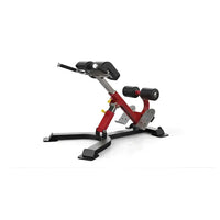 Sterling Series red and black adjustable back extension machine with padded rollers for multi hyper extension compact design