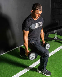 Black urethane dumbbells set for home training with white 12.5 weight markings and silver logo on end caps