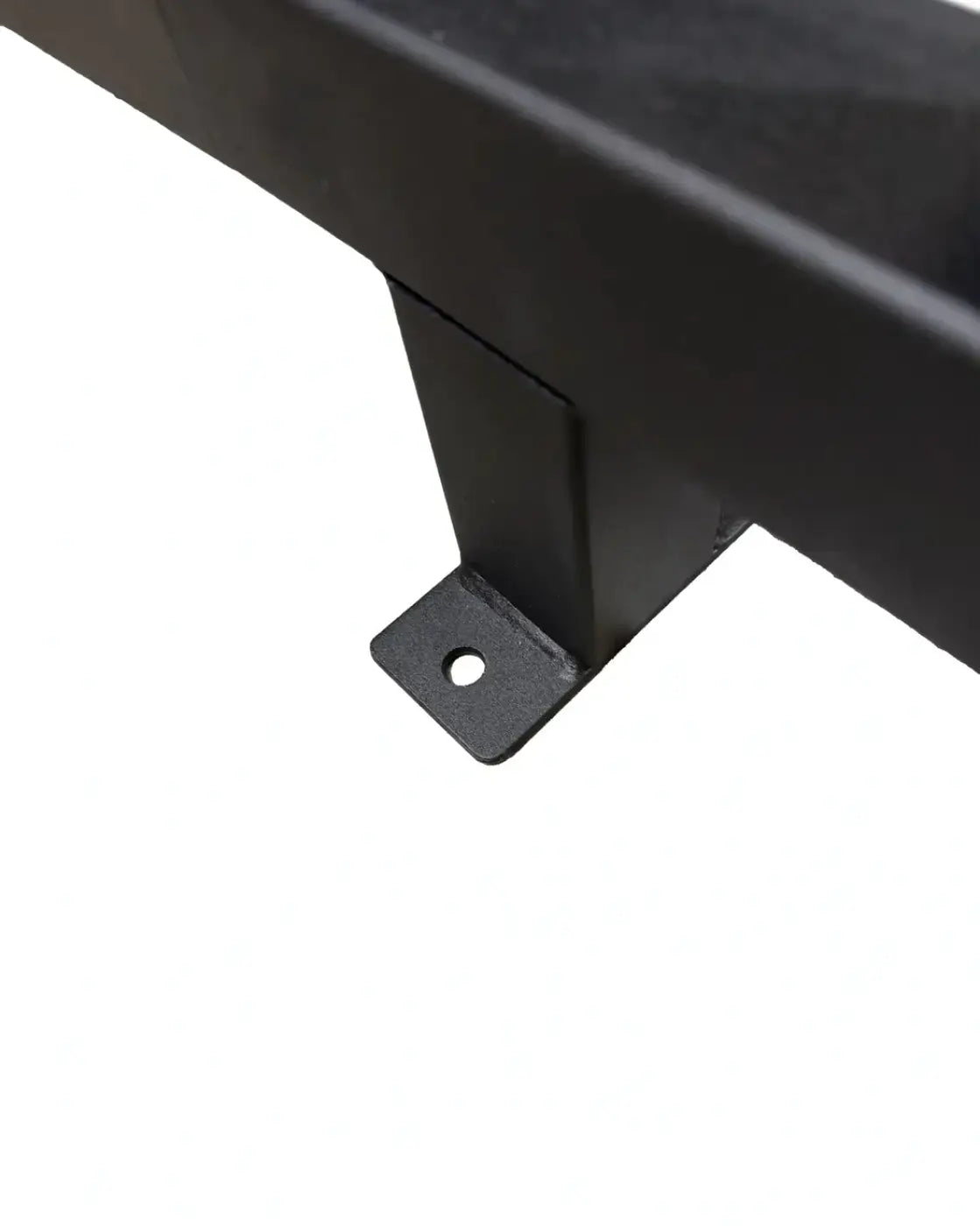 Black metal wall-mounted weight plate storage bracket with square mounting plate and single hole for 4 horn rack